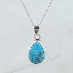 Kingman Turquoise 1.25" Carved 925 Sterling Silver Pendant (REXT57-109)