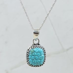 Kingman Turquoise 1.25" Carved 925 Sterling Silver Pendant (REXT57-104)