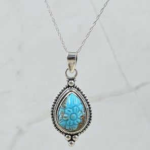 Kingman Turquoise 1.25" Carved 925 Sterling Silver Pendant (REXT57-97)
