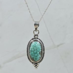 Kingman Turquoise 1.25" Carved 925 Sterling Silver Pendant (REXT57-96)