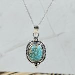 Kingman Turquoise 1.25" Carved 925 Sterling Silver Pendant (REXT57-93)