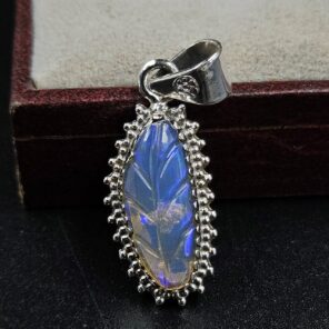 Ethiopian Opal Carved 1.25" 925 Sterling Silver Pendant (REXT59-99)