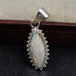 Ethiopian Opal Carved 1.25" 925 Sterling Silver Pendant (REXT59-112)