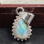 Ethiopian Opal Carved 1" 925 Sterling Silver Pendant (REXT59-113)