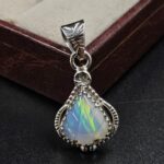 Ethiopian Opal Carved 1" 925 Sterling Silver Pendant (REXT59-115)
