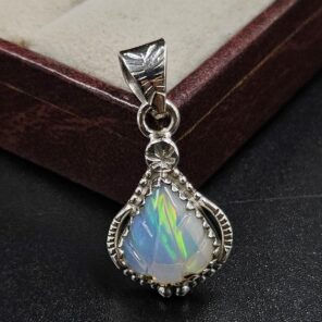 Ethiopian Opal Carved 1" 925 Sterling Silver Pendant (REXT59-115)