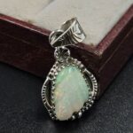 Ethiopian Opal Carved 1.25" 925 Sterling Silver Pendant (REXT59-116)