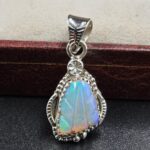 Ethiopian Opal Carved 1.25" 925 Sterling Silver Pendant (REXT59-117)
