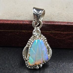 Ethiopian Opal Carved 1.25" 925 Sterling Silver Pendant (REXT59-117)