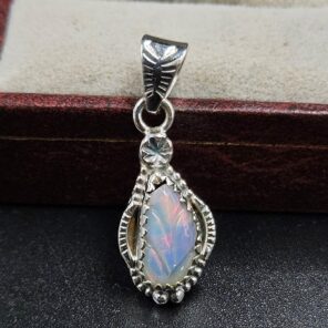 Ethiopian Opal Carved 1.25" 925 Sterling Silver Pendant (REXT59-119)