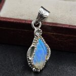 Ethiopian Opal Carved 1.25" 925 Sterling Silver Pendant (REXT59-120)