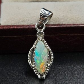 Ethiopian Opal Carved 1.25" 925 Sterling Silver Pendant (REXT59-122)
