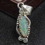 Ethiopian Opal Carved 925 Sterling Silver Pendant (REXT80-64)